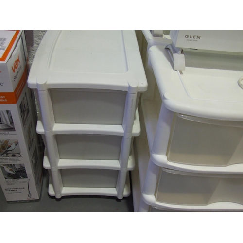 245 - 3 White sets of plastic drawers + 2 heaters