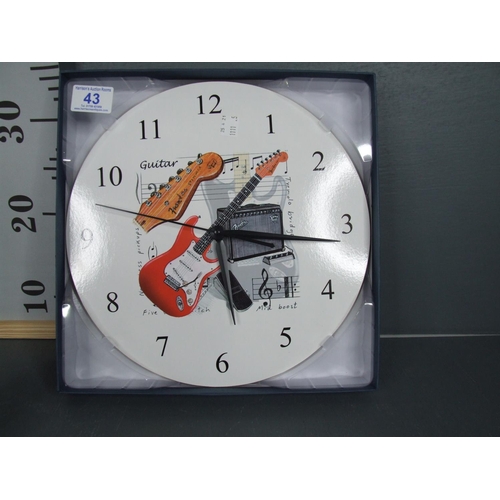 43 - Fender clock guitar + mug