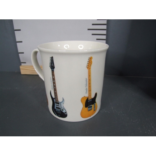 43 - Fender clock guitar + mug