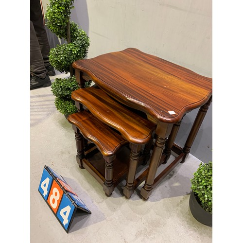 484 - Nest of 3 mahogany tables