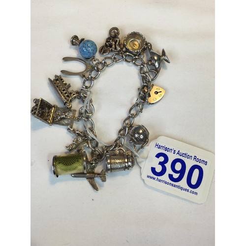 390 - Silver charm bracelet 52.2g total