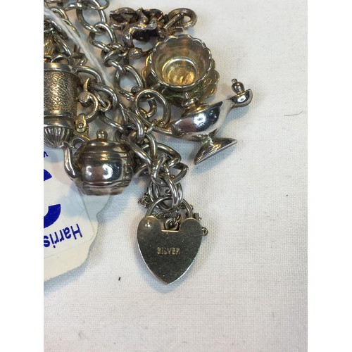 390 - Silver charm bracelet 52.2g total
