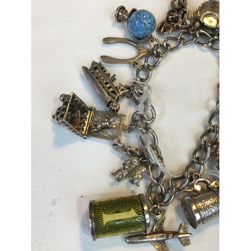 390 - Silver charm bracelet 52.2g total