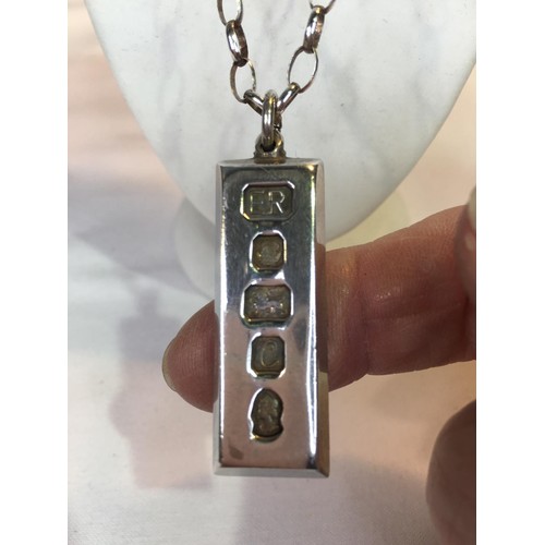 395 - Silver bullion bar & chain 37.9g