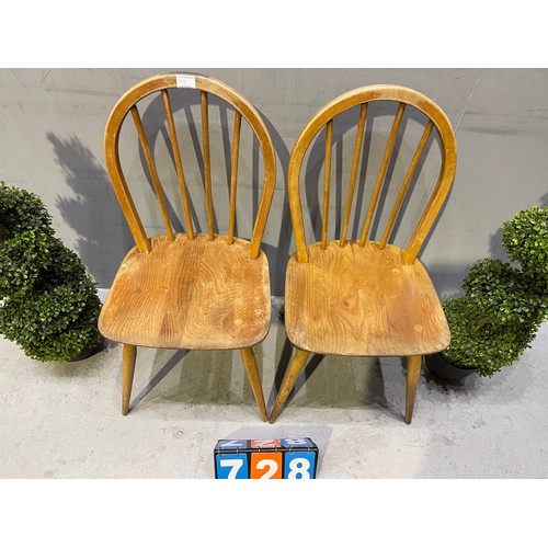 728 - Pair of ercol chairs (slight split to top)