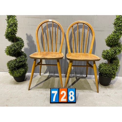 728 - Pair of ercol chairs (slight split to top)