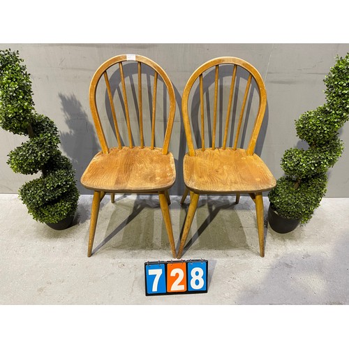 728 - Pair of ercol chairs (slight split to top)