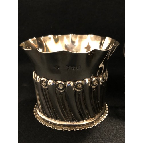 38 - 3 Pieces silver, vase , cream jug sugar bowl all hall marked 334g