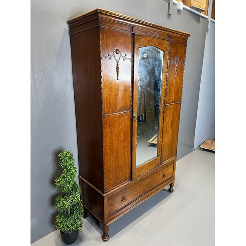 468 - Antique oak mirror fronted wardrobe