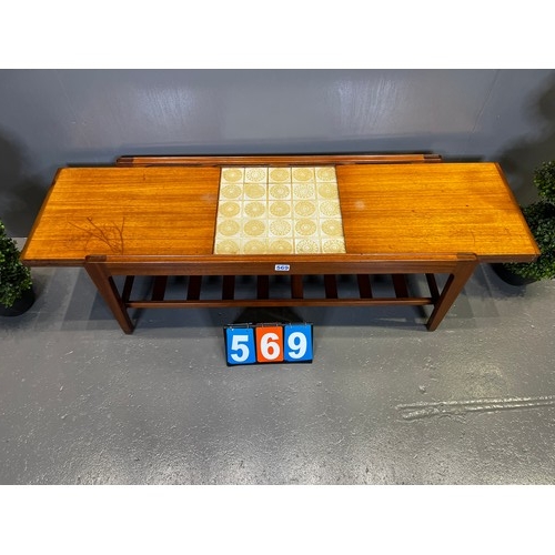 569 - G-plan? teak mid century coffee table with pull out sides