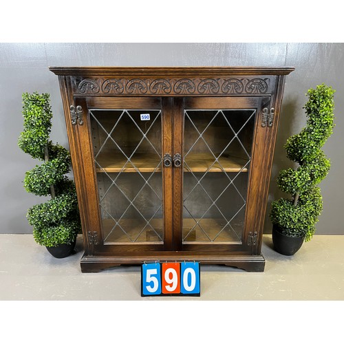 590 - Oak leaded glass bookcase