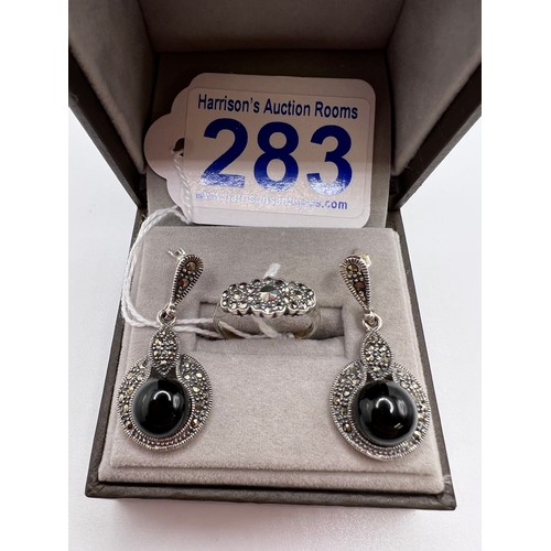 283 - 9ct gold on Silver marcasite ring & pair of silver marcasite earrings Size L