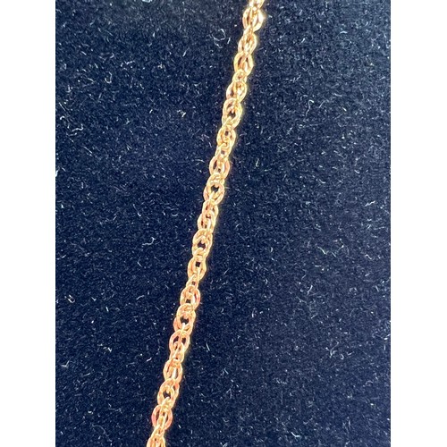 289 - 9ct Gold cross & chain 1.7g