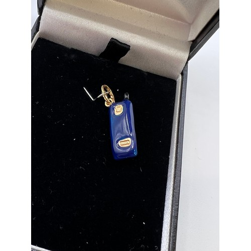 327 - 9ct Gold & enamel mobile phone pendant 1g