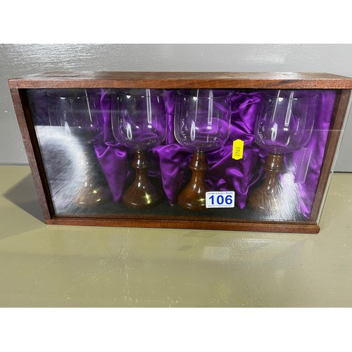 106 - Wooden casket with 4 glass & wood stem glasses