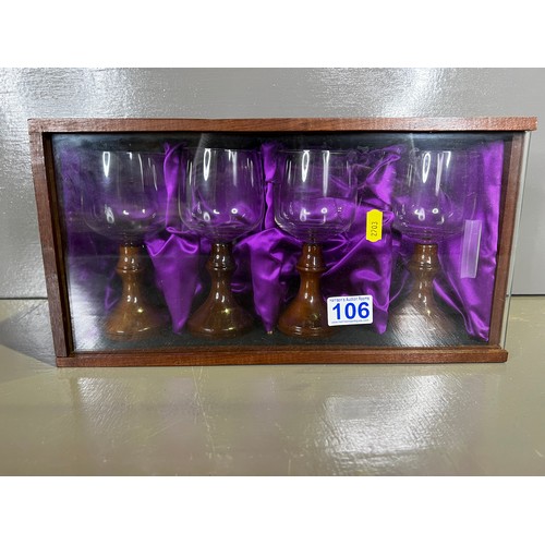 106 - Wooden casket with 4 glass & wood stem glasses