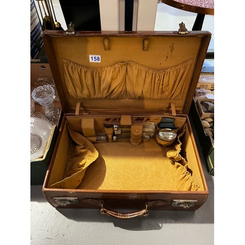 158 - Leather traveling case with brushes/bottles etc