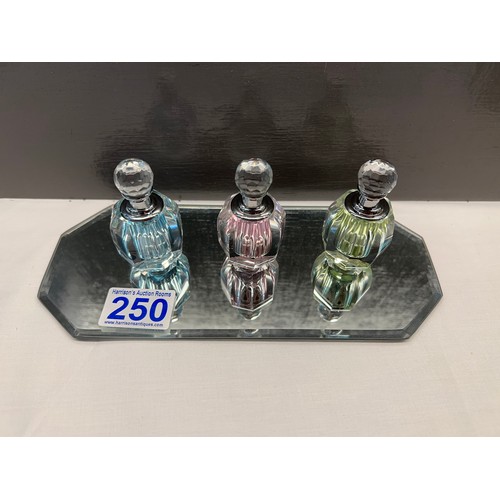 250 - Glass perfume bottles on glass stand