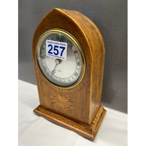 257 - Oak inlaid Edwardian Elliot clock with wind up movement working