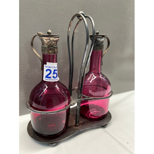 258 - Victorian cranberry vinegar bottles on silver plate stand A/F