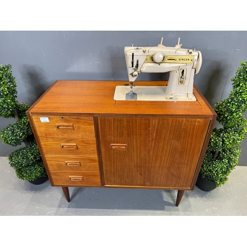 736 - Danish? teak sewing machine in cabinet