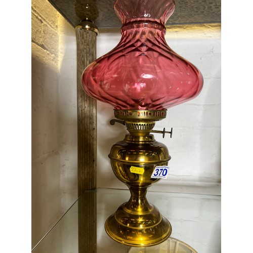 370 - Brass & cranberry glass oil lamp with funnel