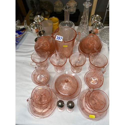 397 - Pink glass cups/ saucers salts/ pepper jug etc