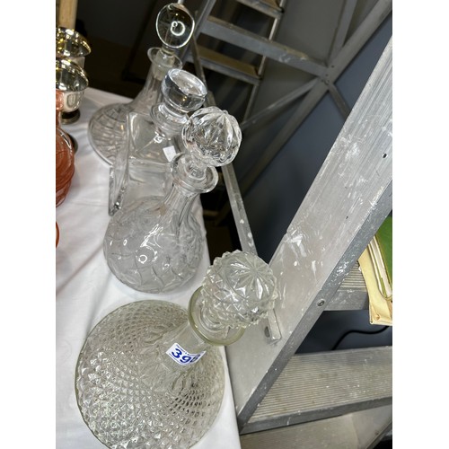 398 - 4 Glass decanters