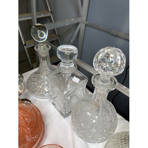 398 - 4 Glass decanters