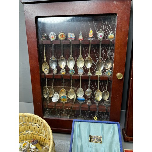 11 - Souvenir spoons in cabinets + basket of spoon