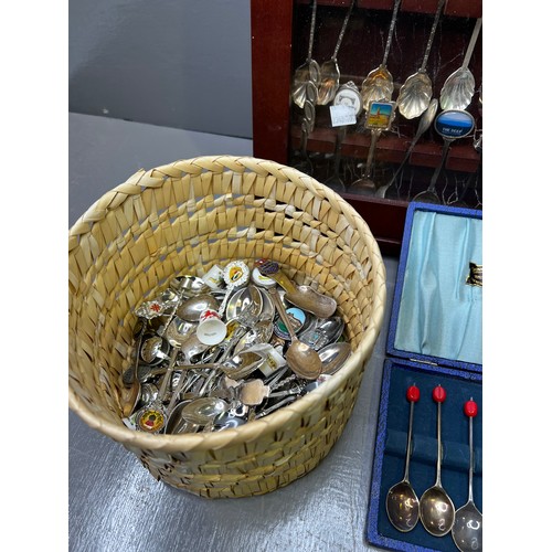 11 - Souvenir spoons in cabinets + basket of spoon