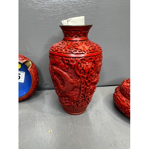 75 - Cinnabar? vase + 2 dishes