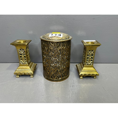 114 - Pair of early brass candle sticks + brass scribed lidded jar