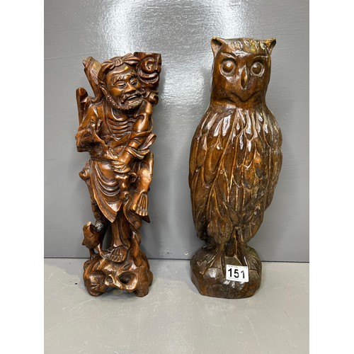 151 - 2 Carved wooden figures