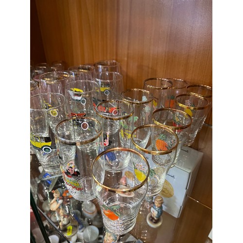 202 - 9 Sets of glasses inc collectable cars