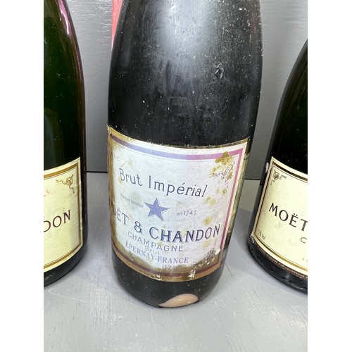 308 - 1Bottle of Moet & Chandan champagne +1Bottle of Moet & Chandan stamped contauins ginger beer for the... 