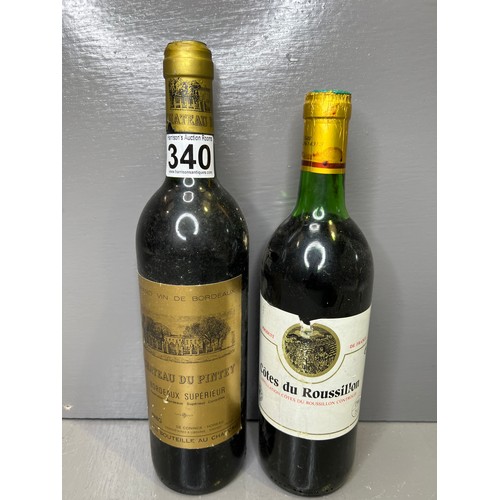 340 - 2 Vintage bottles of wine