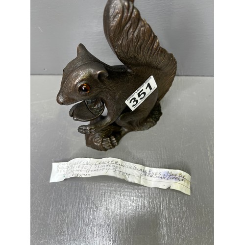 351 - Cast Bronze ? Squirrel nut cracker with glass eyes