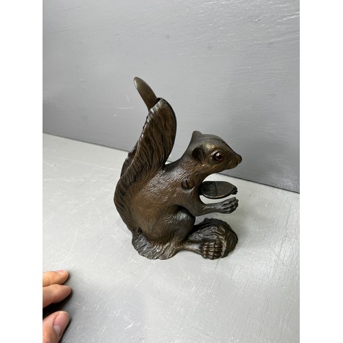 351 - Cast Bronze ? Squirrel nut cracker with glass eyes