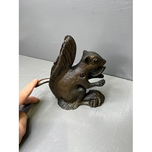 351 - Cast Bronze ? Squirrel nut cracker with glass eyes