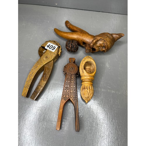 409 - 20th c Treen Nut Crackers.