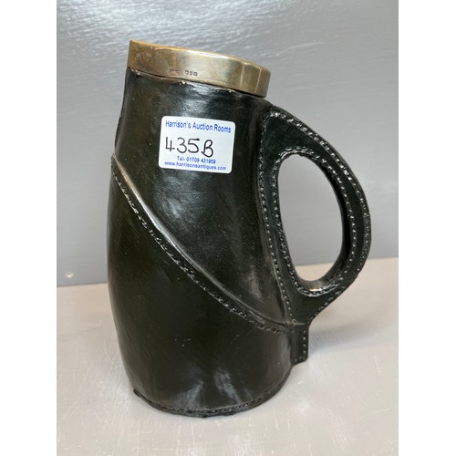 435B - Early royal Doulton leather jack jug with silver rim