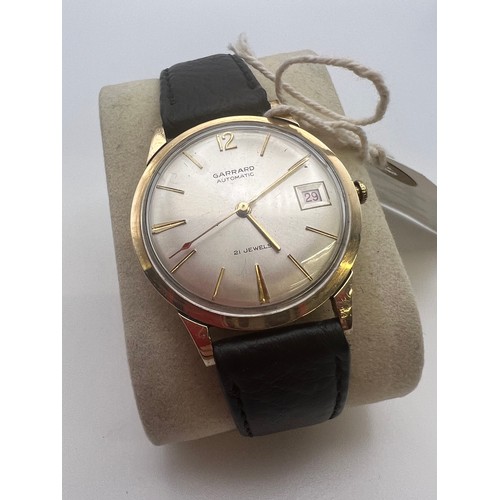 447 - Garrard 9ct gold gents watch automatic