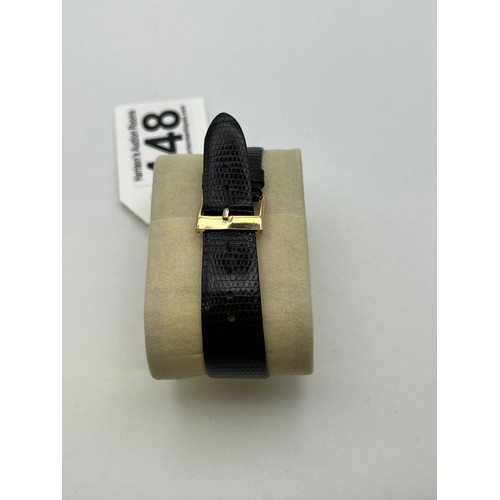 448 - 18ct Gold gents avia watch