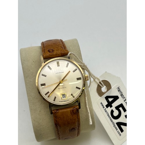 452 - Garrard 9ct gold gents watch with leather strap automatic inscribed