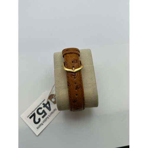 452 - Garrard 9ct gold gents watch with leather strap automatic inscribed