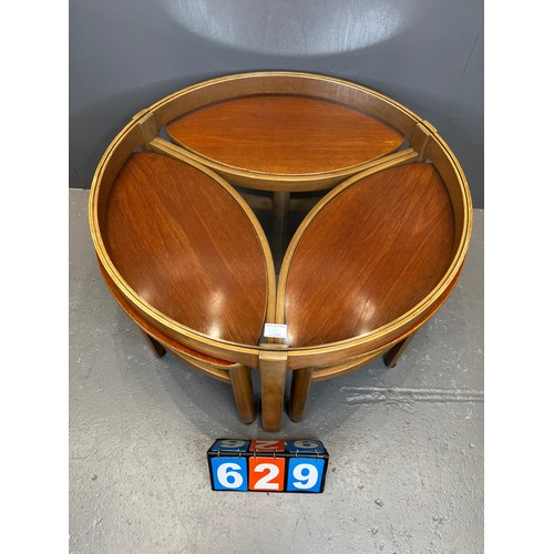 629 - Nathan teak trinity nest of table round