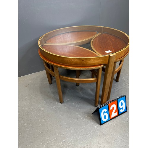 629 - Nathan teak trinity nest of table round