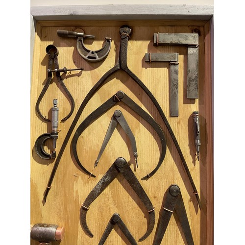 2 - Vintage tools in wall mounted display