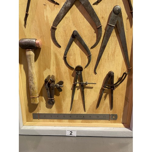 2 - Vintage tools in wall mounted display